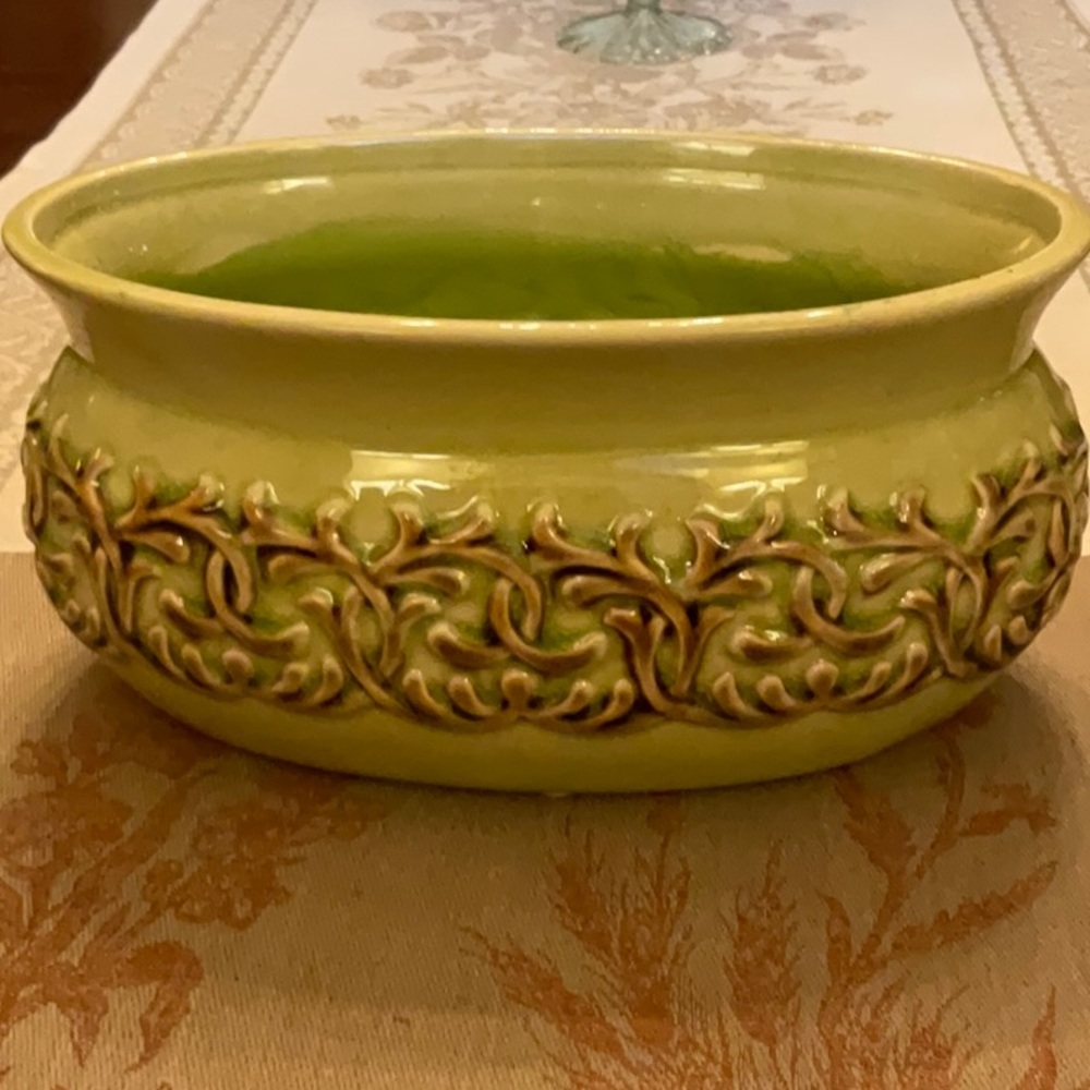 Lovely pale green vintage oval pot.  Great design and mix of colors.  Beautiful